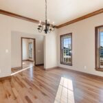 1354 Lucy Ln Formal Dining Room. Stained Maple Crown Molding. Natural Maple Site Finished Hardwood Floors.