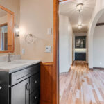 1354 Lucy Ln Powder Room. Black Painted Vanity Cabinet.