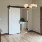 3424 Schubert Place. Sliding Barn Door. Desk Nook. Natural Maple Hardwood Floors.