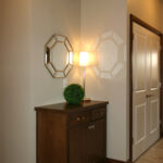 3424 Schubert Drop Zone Cabinet. Stained Maple. Ceramic Tile Floors.