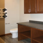 395 Whispering Creek Laundry Half Bath. Folding Counter Open Below for Baskets.