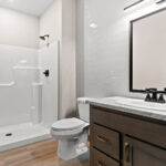 6067 Governors Woods Main Bathroom. Tiled Bathroom Wall.