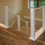 7714 Saint Andrews Stairs. Cable Railing with Painted Wood Posts + Rail.