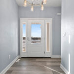 4976 Plum Bottom Rd Foyer. 3/4 Lite Front Entry Door with 12" Full-View Sidelites.