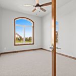 3320 Cottage Hill Bedroom. Full-View Clear Glass Door. Arched Transom Window.