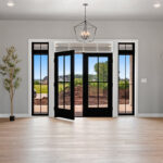 704 Royal St Pats Foyer. Black Double Pair Full View Glass with Grilles Front Door with Transom Flanked by Windows to Floor and White Painted Trim.