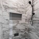 704 Royal St Pats Tiled Shower. Shampoo Niche. Foot Niche. Hexagon Floor Tile. Rain Shower Head. Handheld Sprayer.