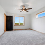 6170 Saint Patrick Owners Bedroom. Transom Window Over Bed.