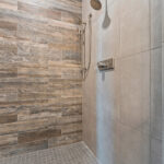 2966 Sugar Bush Owners Tiled Shower. Coney Island Walnut Wood Plank Wall Tile. Fusion Carbon Floor Tile.