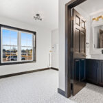 525 E Greenfield Laundry & Powder Room. Sheet Vinyl Floors. Vessel Sink.