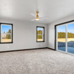 525 E Greenfield Owners Bedroom. Vinyl Windows & Patio Door with Stained Maple Jambs & Casing Trim.