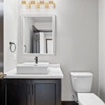 525 E Greenfield Powder Room. Vessel Sink in Laminate Countertop. Vinyl Tile Floors.