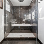 525 E Greenfield Wet Room. Vinyl Tile Floors. Tiled Shower. Jetted Drop-In Tub in Tiled Tub Deck Surround. Heavy Glass Shower Enclosure. Rain Shower Head.