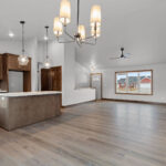 526 Rosemary Living Room & Kitchen. Luxury vinyl plank floors. Cathedral ceiling.