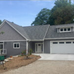 9976 Fox Lane Exterior. Deck with Cable Railing.