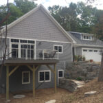 9976 Fox Lane Exterior. Deck with Cable Railing.