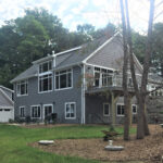 9976 Fox Lane Exterior. Deck with Cable Railing.