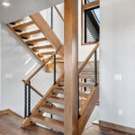 10510 Sugar Creek Open Riser Stairs. Maple Glu-Lam, Black Cable Rail.
