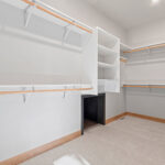 14421 N Paya Lake Rd Owners Closet. Laundry basket pass through from closet to laundry room.