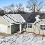 2202 Patty Ln Exterior. Certainteed Monogram "Cypress" Siding with "Moire Black" shingles.