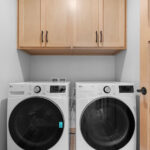 2202 Patty Ln Laundry. Canyon Americas "Fall Branch Hickory" vinyl plank flooring.